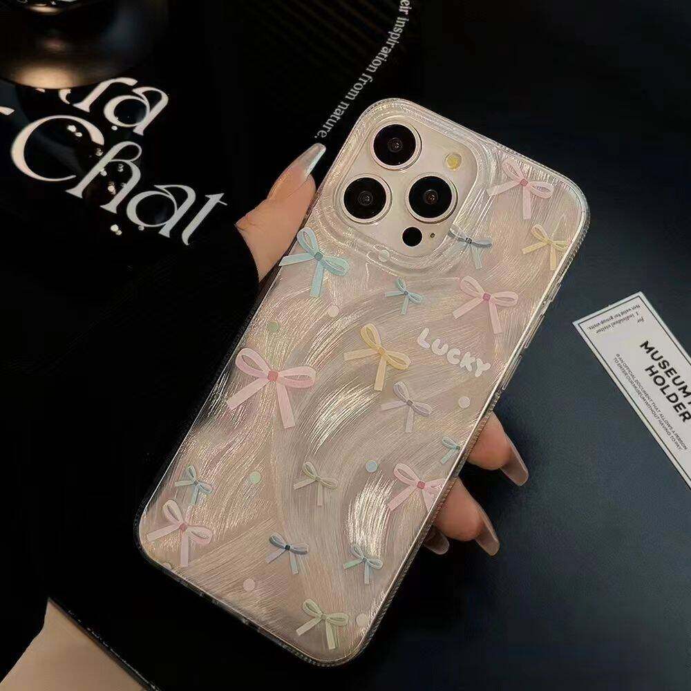カラフルな弓シルバーレーザープリントケース OPPO リノ  - Oppo Reno 12 のレビューと価格